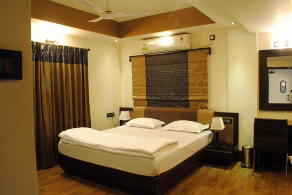 Tangerine Guest House Калькутта Номер фото