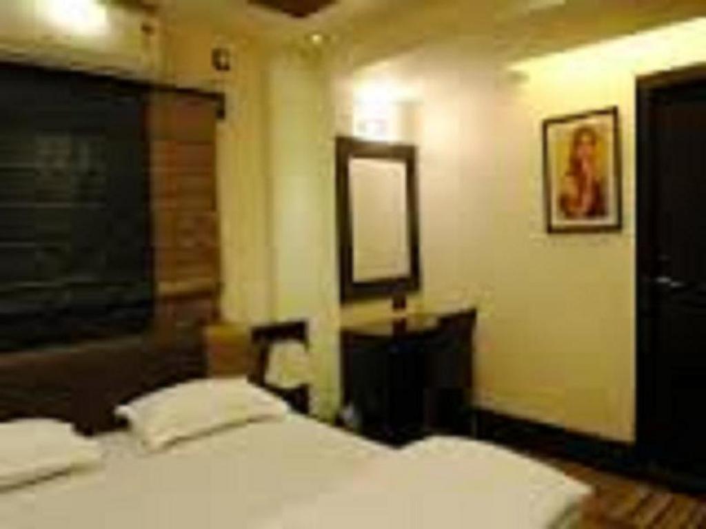 Tangerine Guest House Калькутта Номер фото
